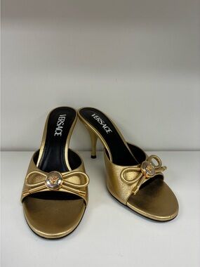 Versace Metallic Gold Open-Toe Slide Heels with Bow Accent